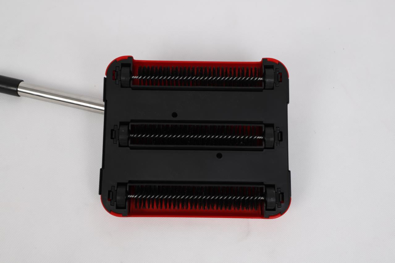 Hand-pushed sweeper